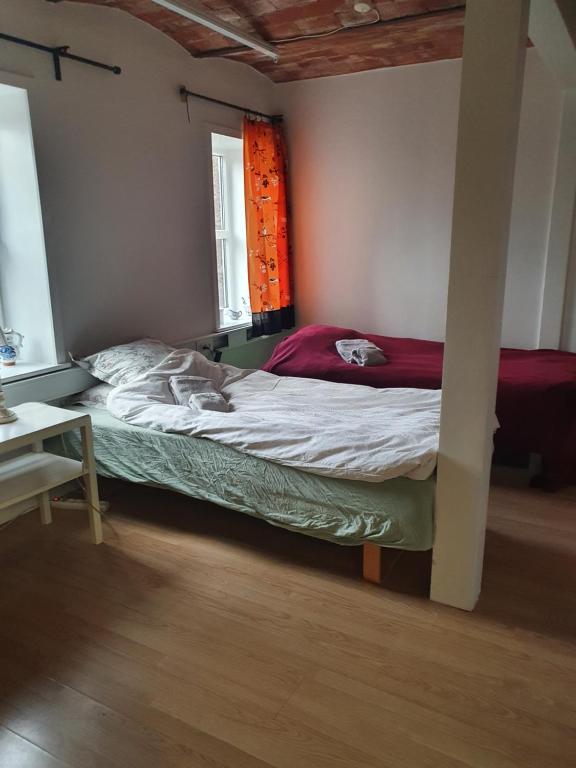 Postel nebo postele na pokoji v ubytování Bøelgaarden