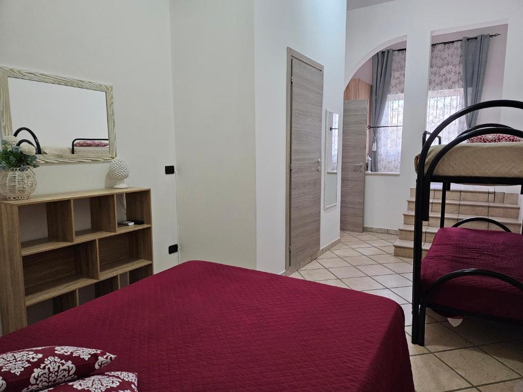 Postel nebo postele na pokoji v ubytování Dimora Sole del Sud