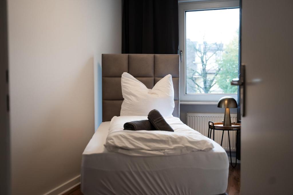Gemütliche & Individuelle Ferienwohnungen in Krefeld - JUNIK Apartments - Deluxe Appartement Met Twee Slaapkamers