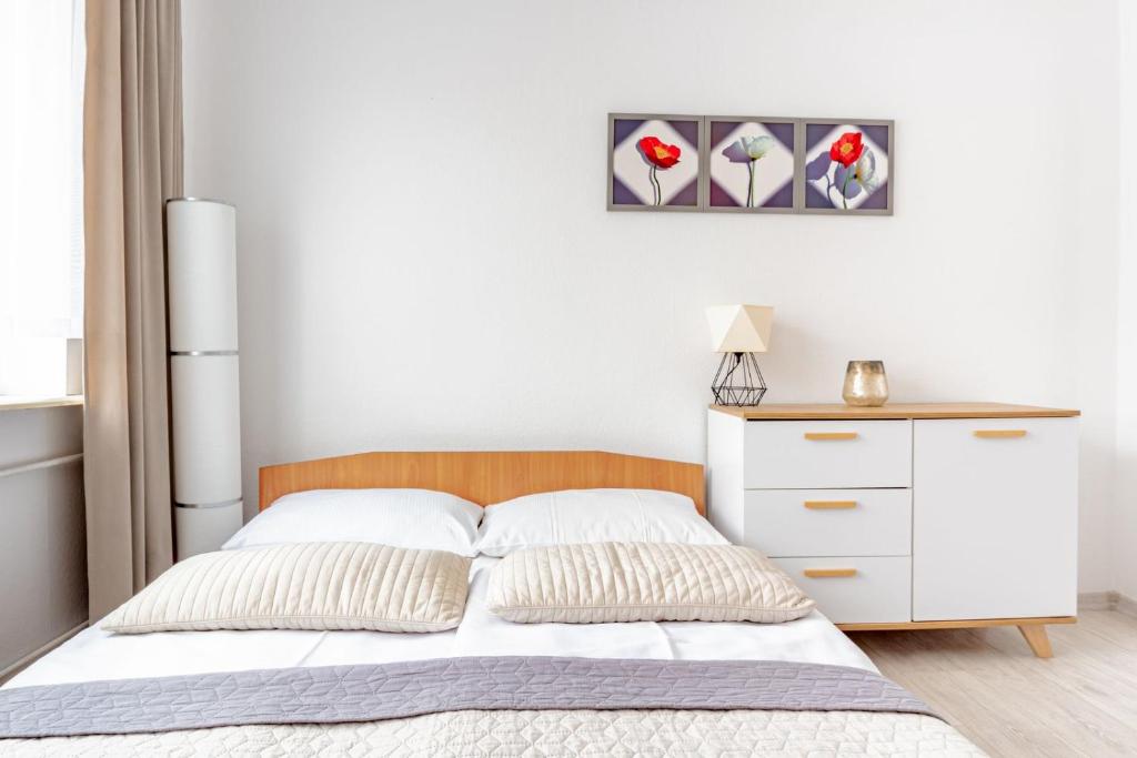 Postel nebo postele na pokoji v ubytování Willa Bliźniak - Pokoje i Apartamenty Bardzo Blisko Plaży