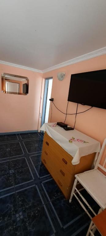 Postel nebo postele na pokoji v ubytování ALOJAMIENTO LAS LILAS