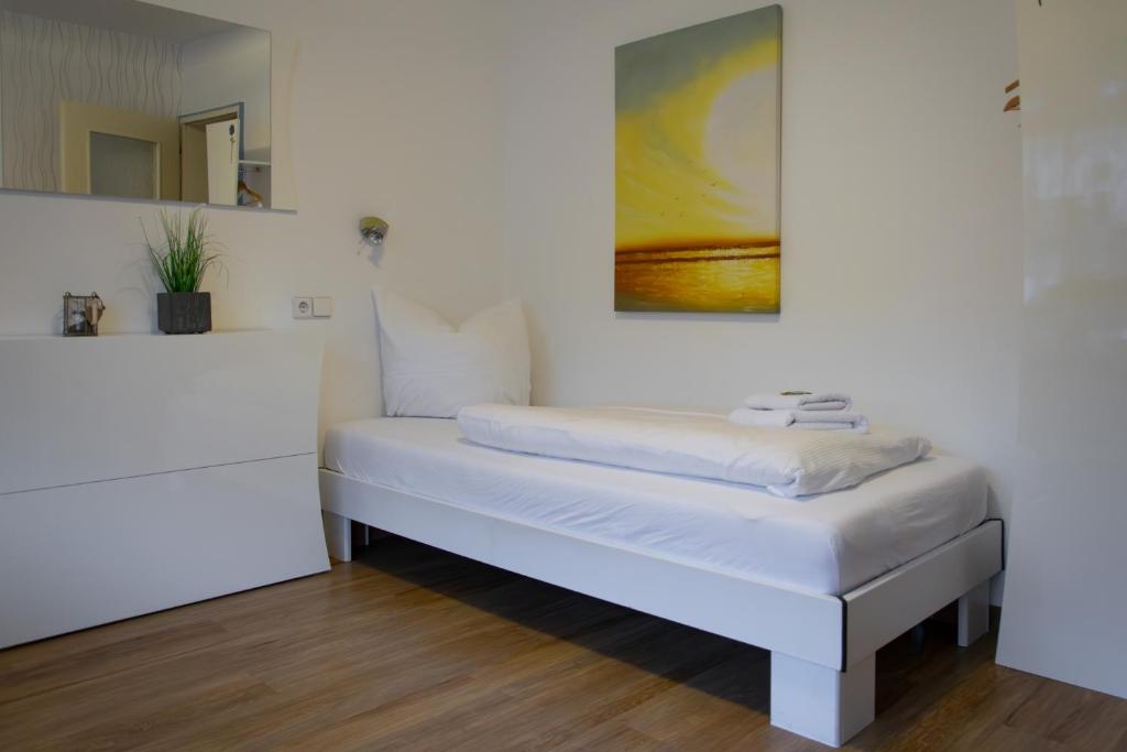 Postel nebo postele na pokoji v ubytování Hotel Sonnenhof Garni