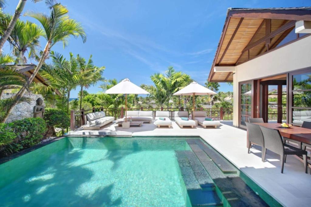 an image of a swimming pool in a villa at Karma Kandara in Uluwatu