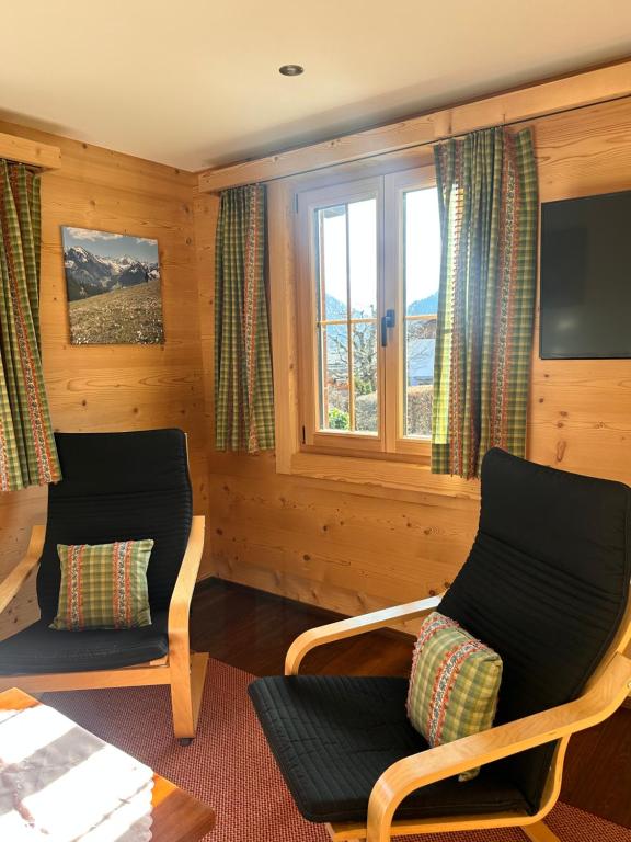Posezení v ubytování Chalet Solaria 2 bedrooms with mountain and garden view