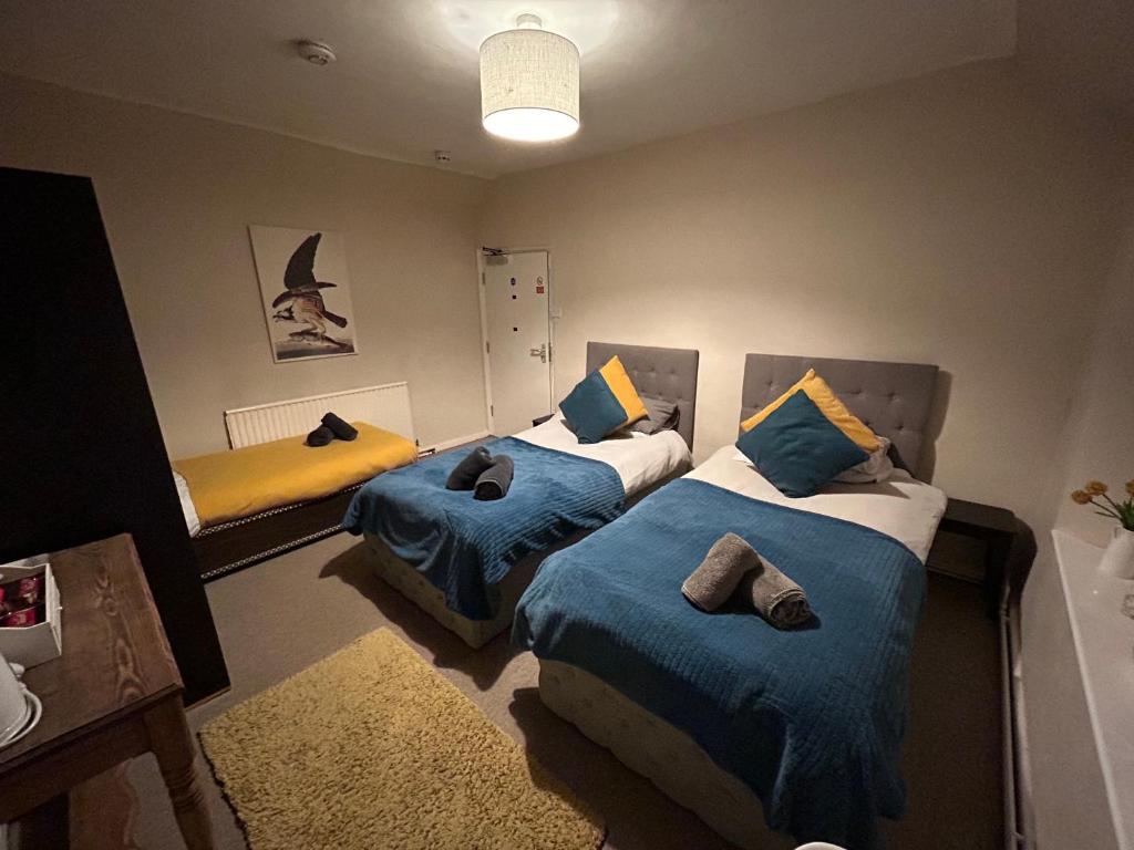 En eller flere senge i et værelse på The Boot Inn 2024 onwards