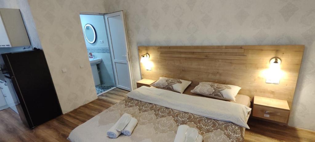 Postel nebo postele na pokoji v ubytování Guest House Alazani Valley