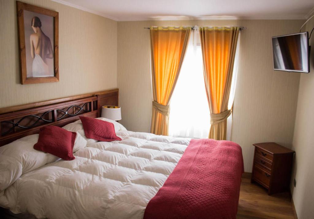 Postel nebo postele na pokoji v ubytování Hotel Terrazas del Mar