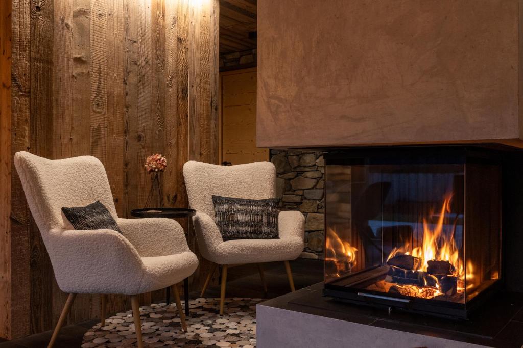 Posezení v ubytování Chalet ORUS - Tirol Kärnten