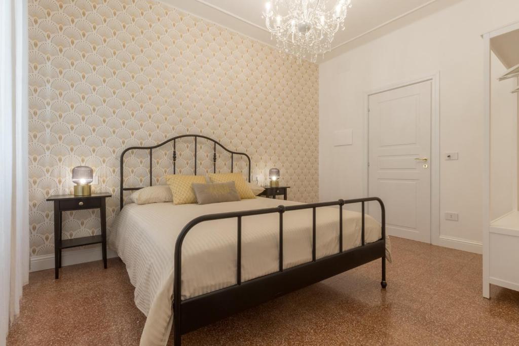 Postel nebo postele na pokoji v ubytování Casa dei Liuti Luxury GuestHouse