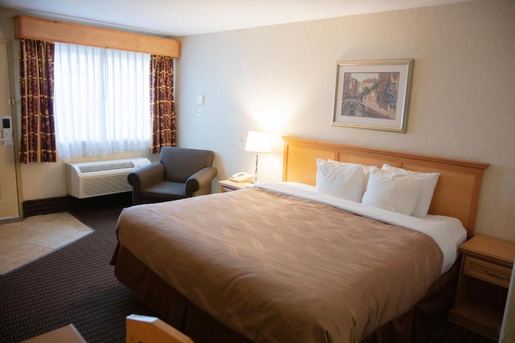 Postel nebo postele na pokoji v ubytování All Stay Suites