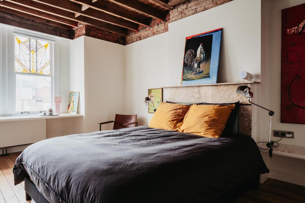 Postel nebo postele na pokoji v ubytování Huis Hector Mechiels ROOM