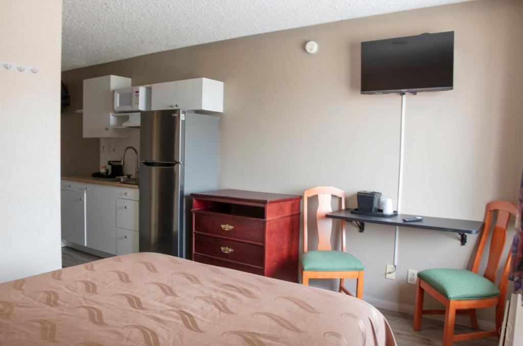 Kuchyň nebo kuchyňský kout v ubytování All Stay Suites