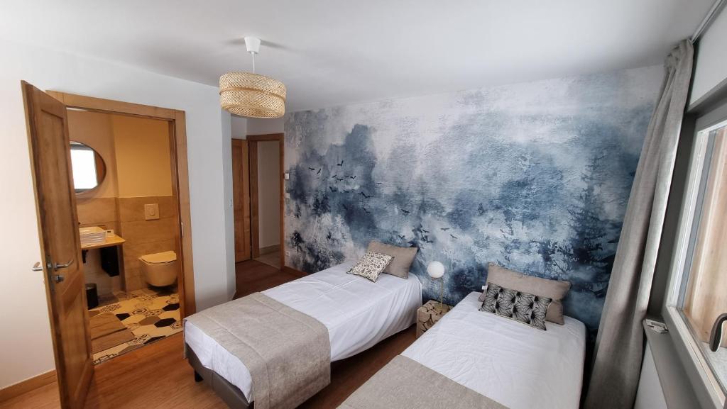 Postel nebo postele na pokoji v ubytování Chalet Terejo & spa
