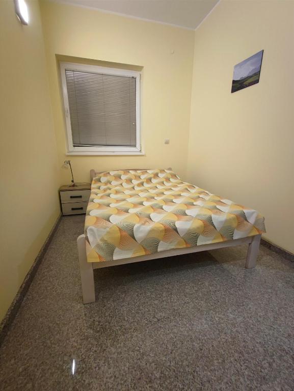 Krevet ili kreveti u jedinici u okviru objekta Apartman Breza Divcibare