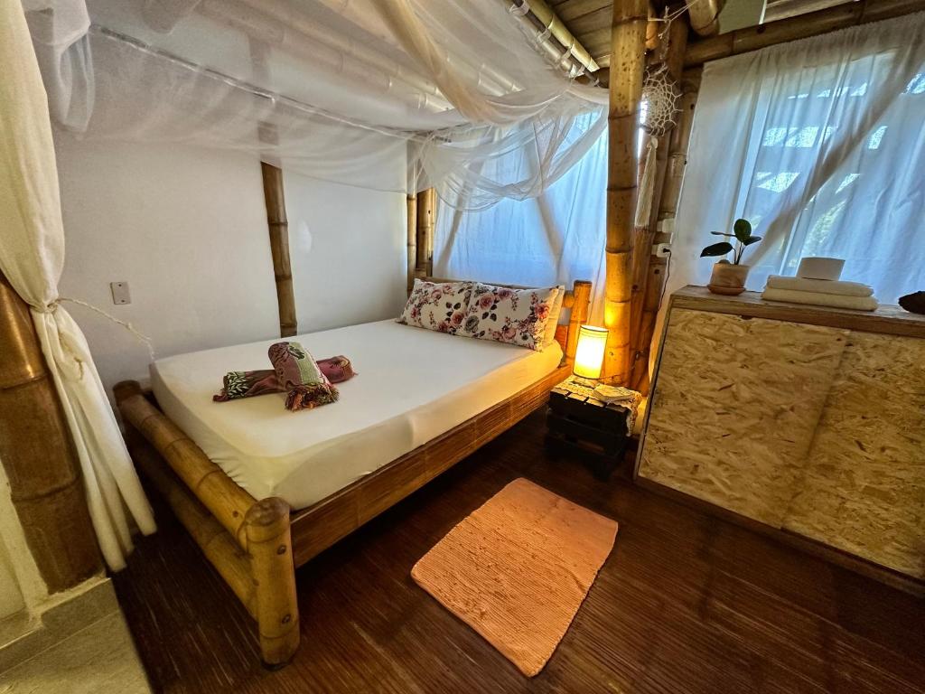 Katil atau katil-katil dalam bilik di Bella Flor Hostel Palomino