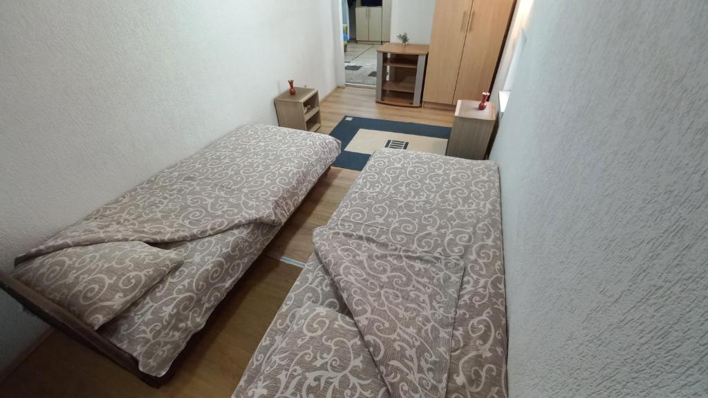 Krevet ili kreveti u jedinici u okviru objekta Kopaonik Apartman Aleksandar