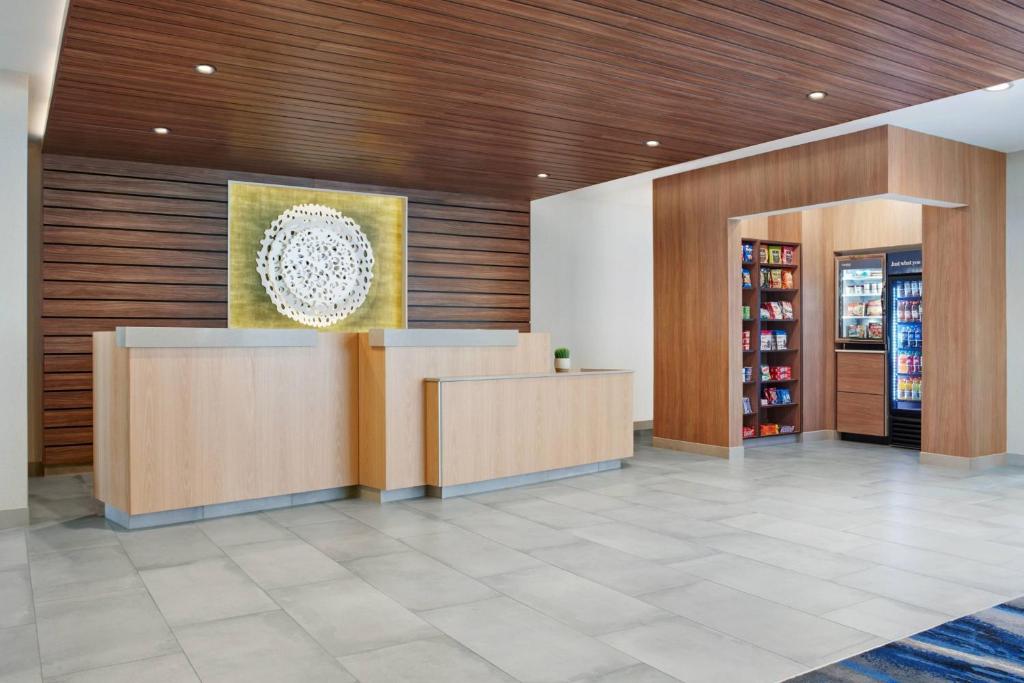 a lobby of a store with a reception desk at Fairfield by Marriott Issaquah in Issaquah