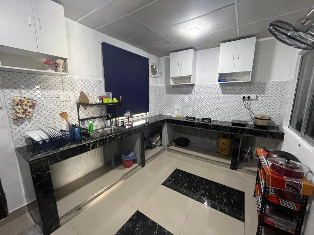 Kuchyň nebo kuchyňský kout v ubytování 3BR House near Toll Yong peng