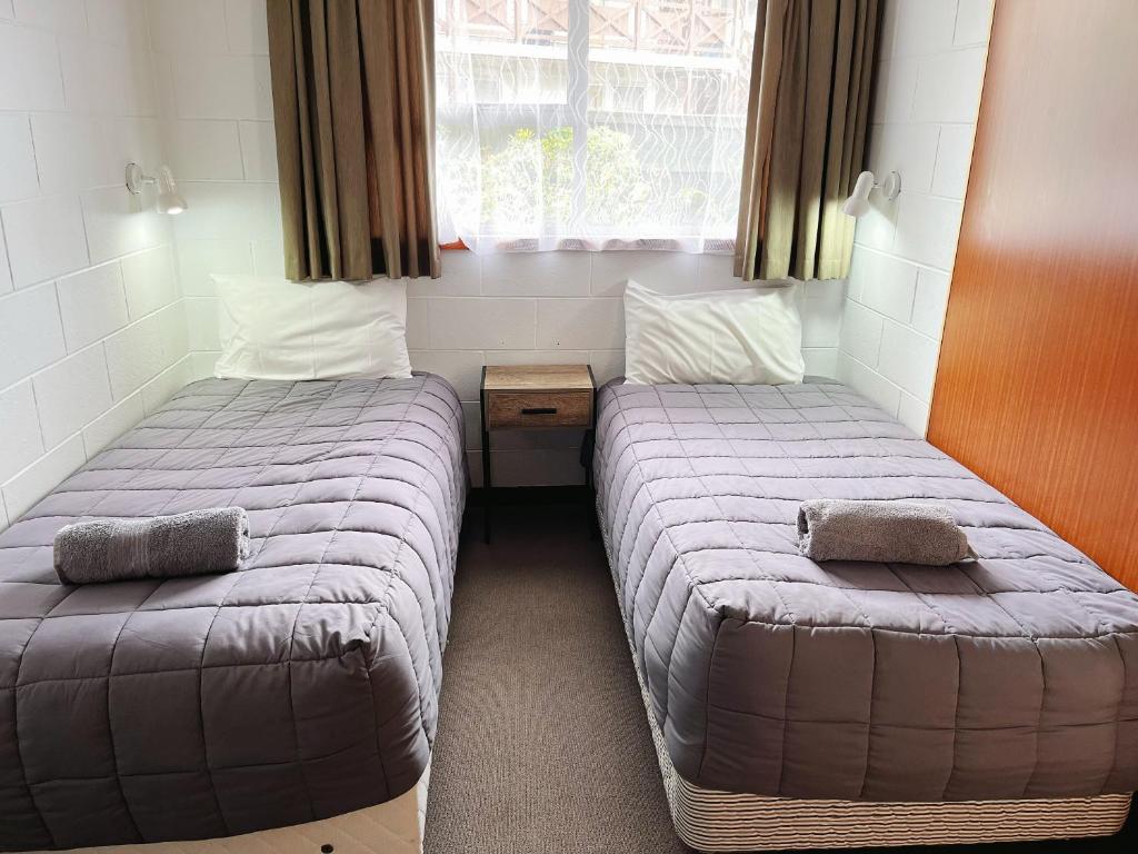 Postel nebo postele na pokoji v ubytování Cumberland Motel