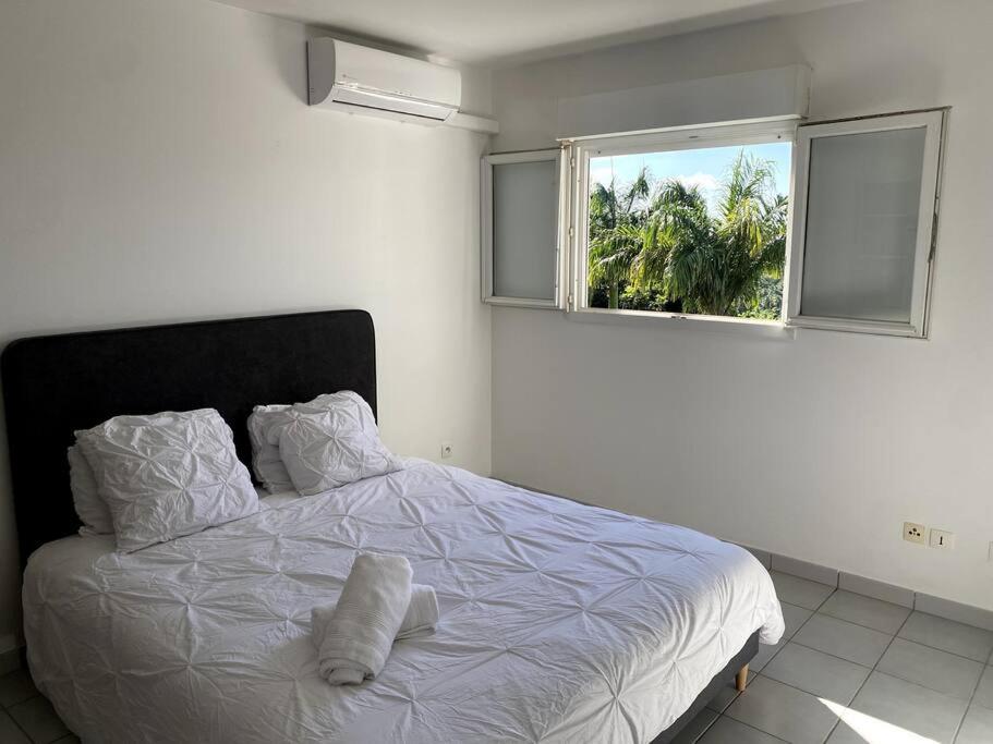 Voodi või voodid majutusasutuse Appartement T2 Chic - vue mer et montagne toas