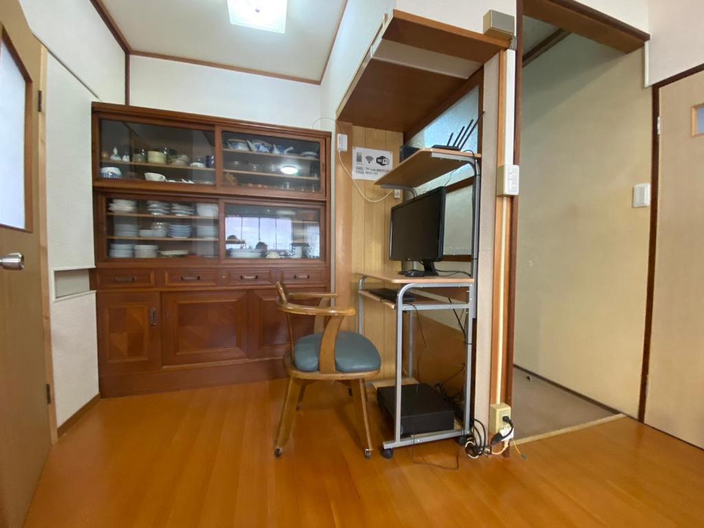 Kuchyň nebo kuchyňský kout v ubytování ゲストハウス アルベルゲ Guesthouse ALBERGUE SAKURA