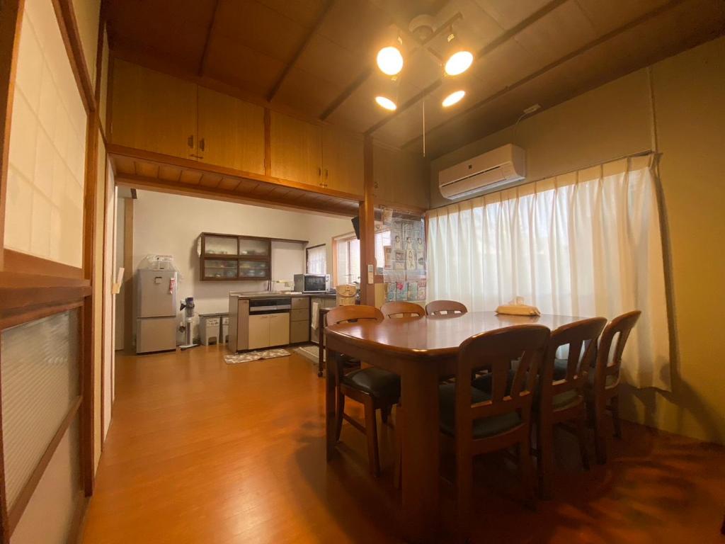 Kuchyň nebo kuchyňský kout v ubytování ゲストハウス アルベルゲ Guesthouse ALBERGUE SAKURA