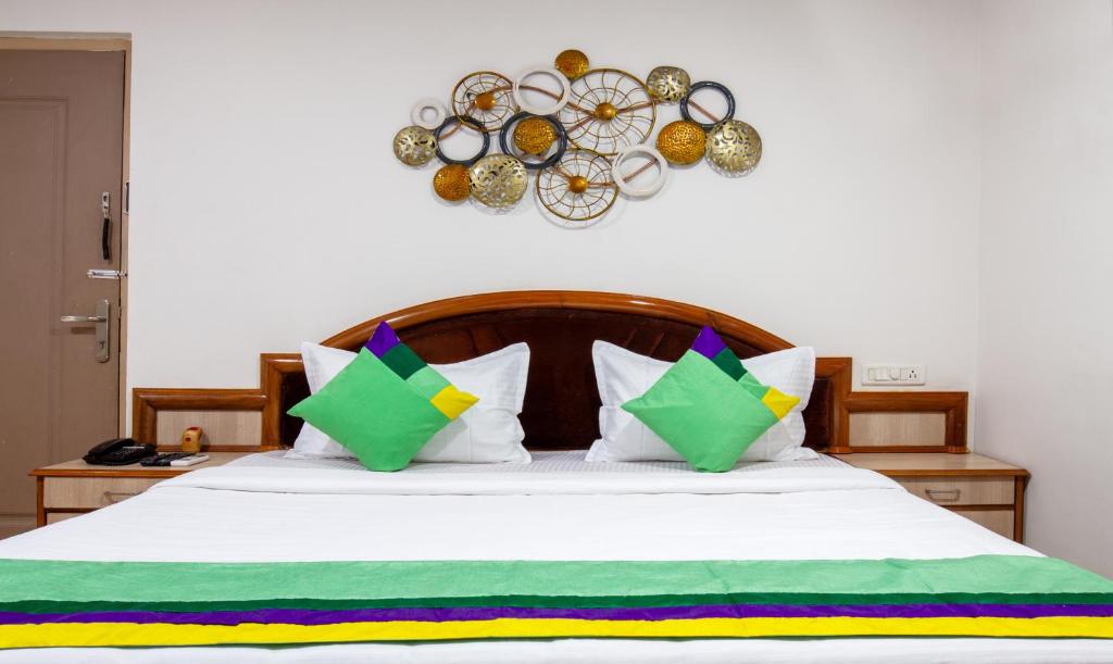 Postel nebo postele na pokoji v ubytování Treebo Y Hotels Elite, Khandagiri