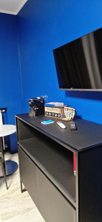 TV a/nebo společenská místnost v ubytování Blu room