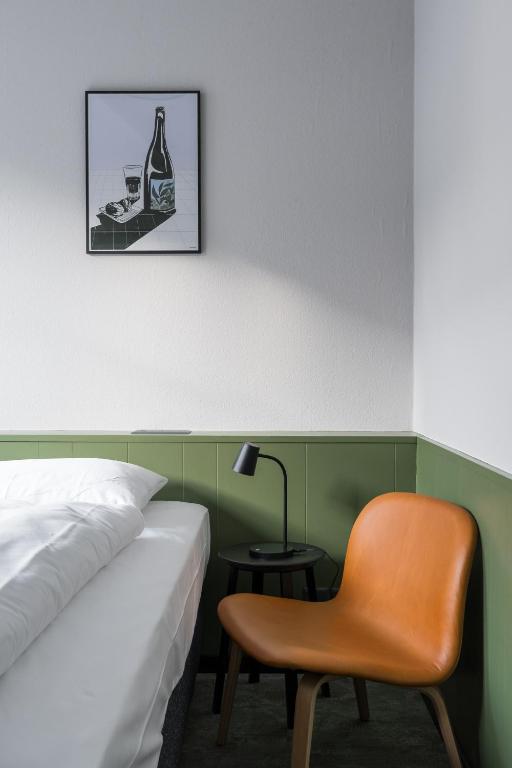 Uma cama ou camas num quarto em Hotel Goldener Stern - contactless check-in