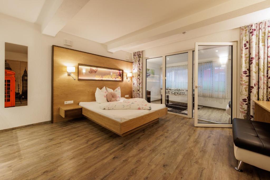 Postel nebo postele na pokoji v ubytování Apartmenthaus Goldeck