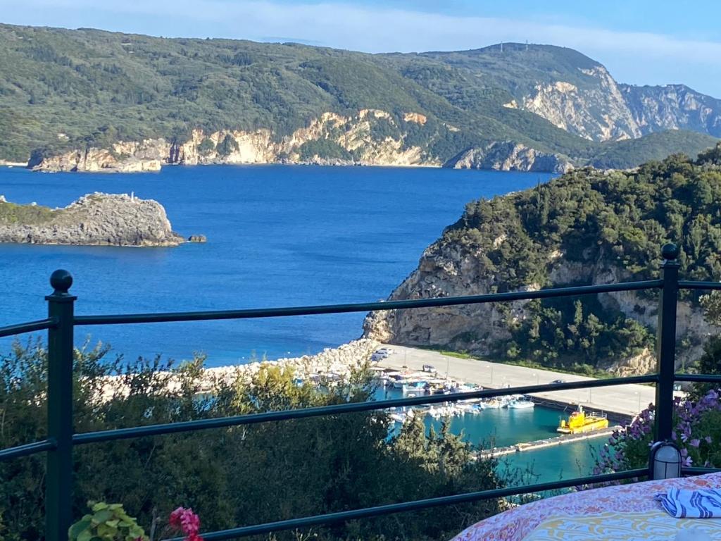 a view of a lake from a balcony at Villa Stephanie in Paleokastritsa