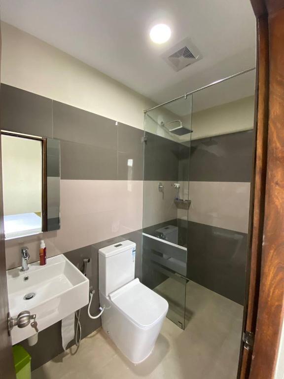 Koupelna v ubytování Lamandu City Hotel