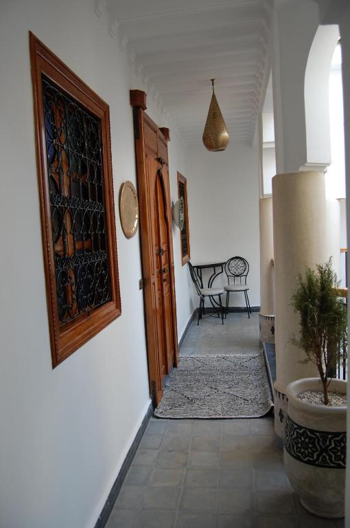 Postel nebo postele na pokoji v ubytování Riad Orient Palace