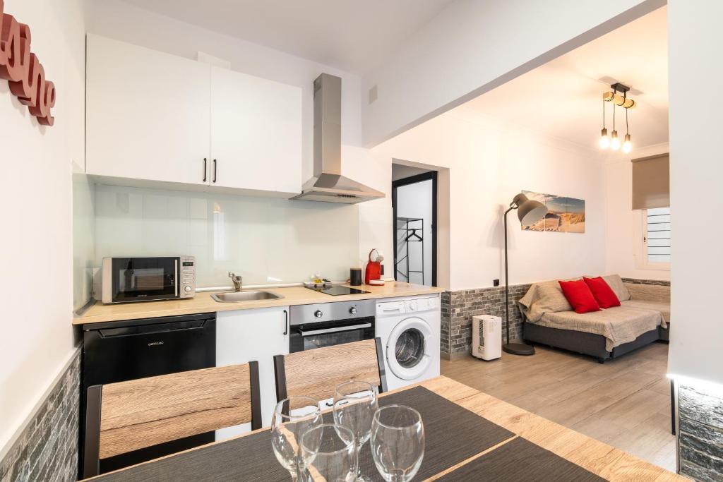 A kitchen or kitchenette at Beach Apartment, next to the sea