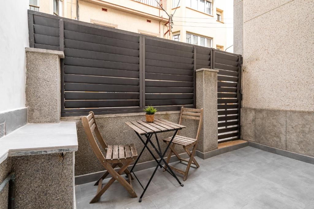A balcony or terrace at Beach Apartment, next to the sea