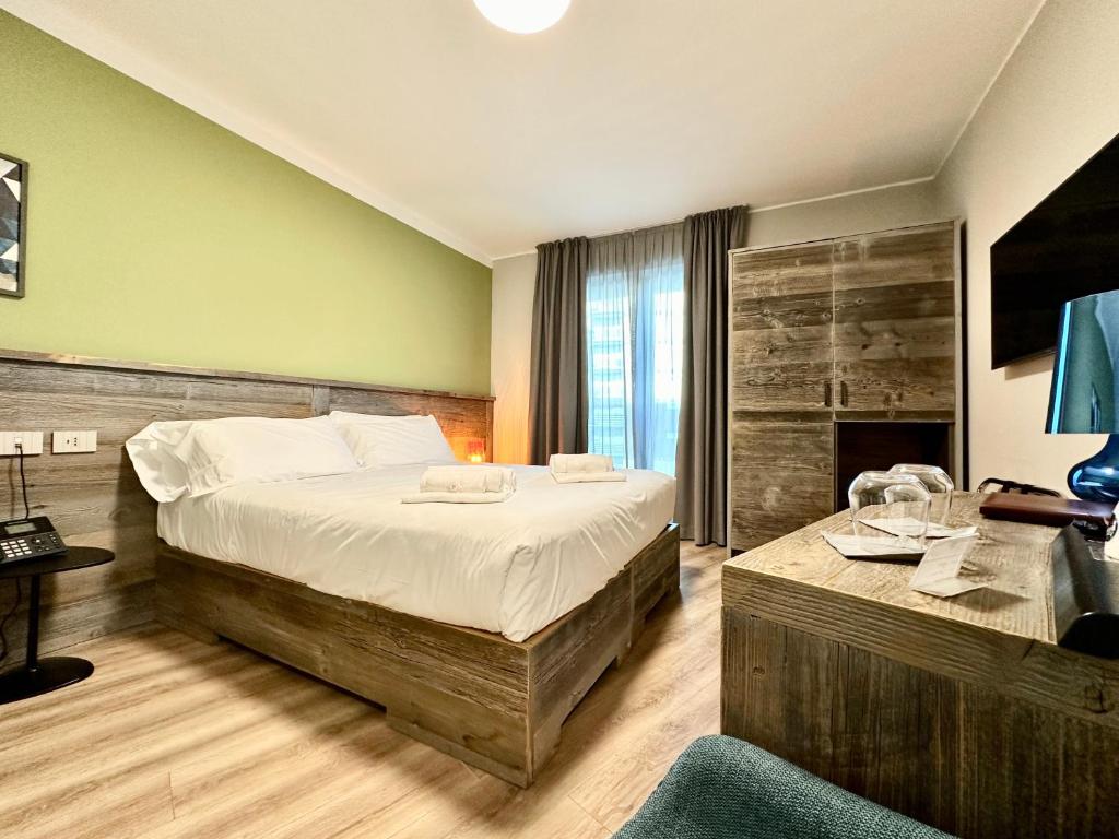 Postel nebo postele na pokoji v ubytování Du Parc Hotel