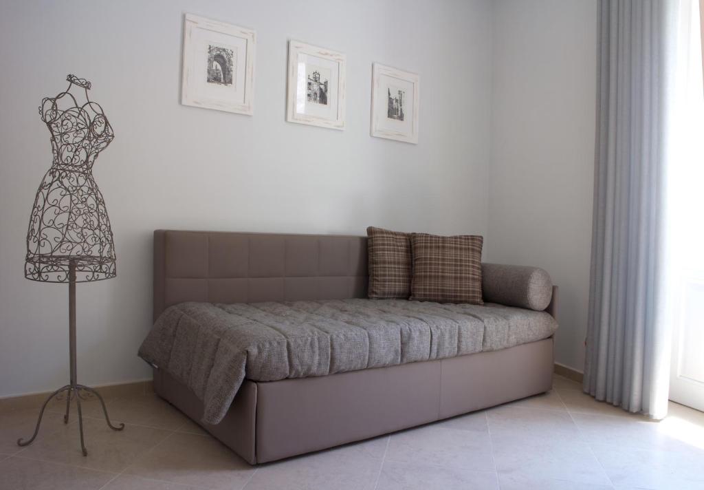 Postel nebo postele na pokoji v ubytování L'Incanto Luxury Rooms