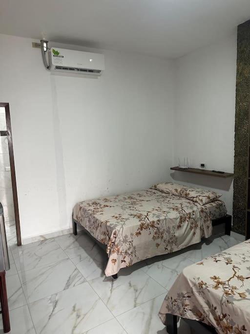 Postel nebo postele na pokoji v ubytování Casa Palmamar