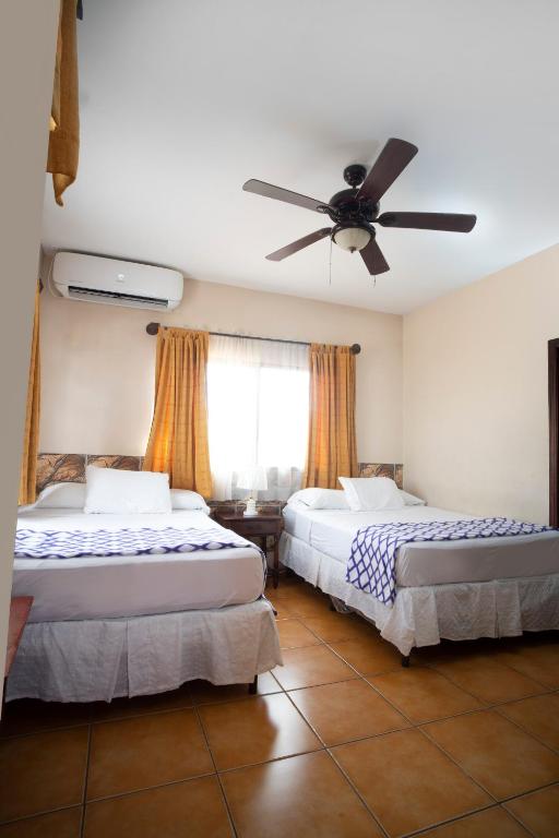 Postel nebo postele na pokoji v ubytování Apart hotel la Trejo