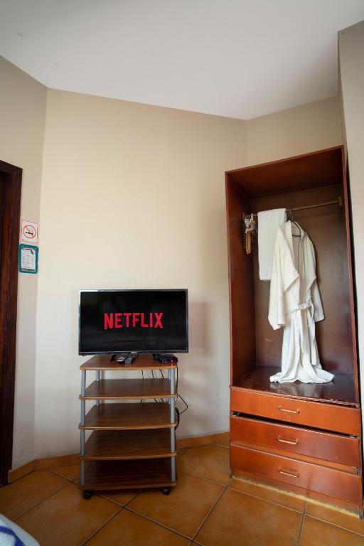TV a/nebo společenská místnost v ubytování Apart hotel la Trejo