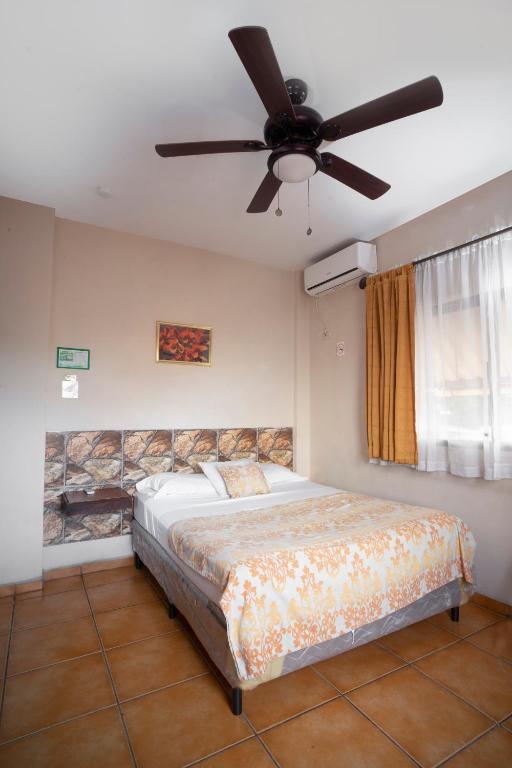 Postel nebo postele na pokoji v ubytování Apart hotel la Trejo