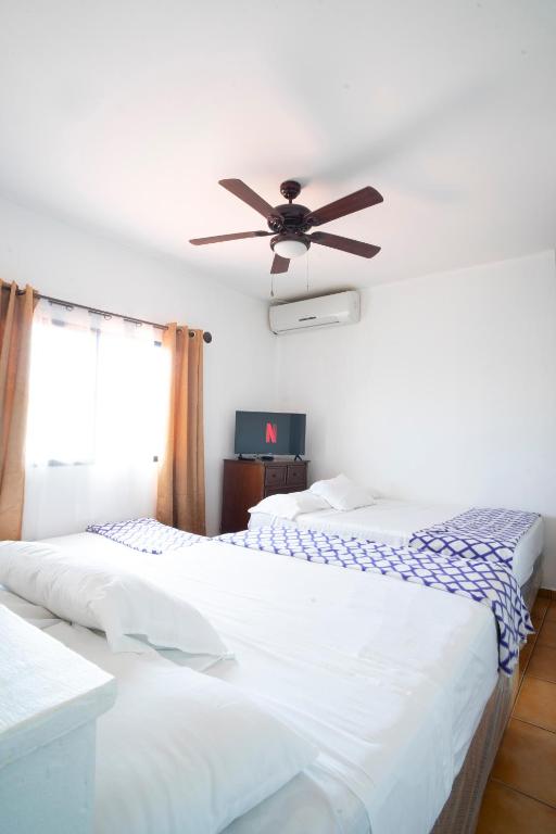 Postel nebo postele na pokoji v ubytování Apart hotel la Trejo