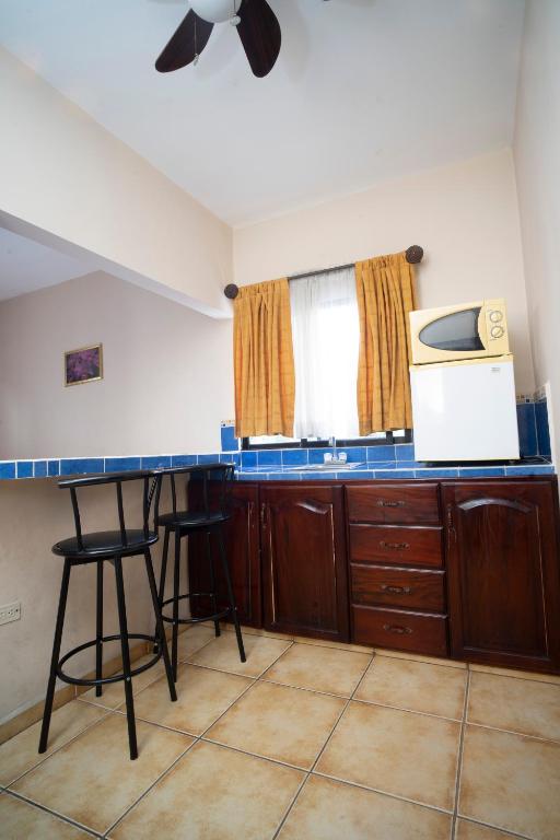 Kuchyň nebo kuchyňský kout v ubytování Apart hotel la Trejo