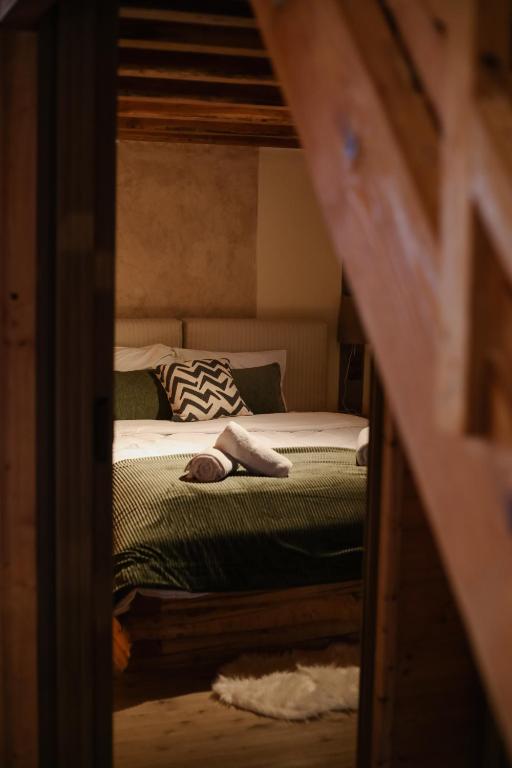 Postel nebo postele na pokoji v ubytování Τετραπολις Wellness Farm