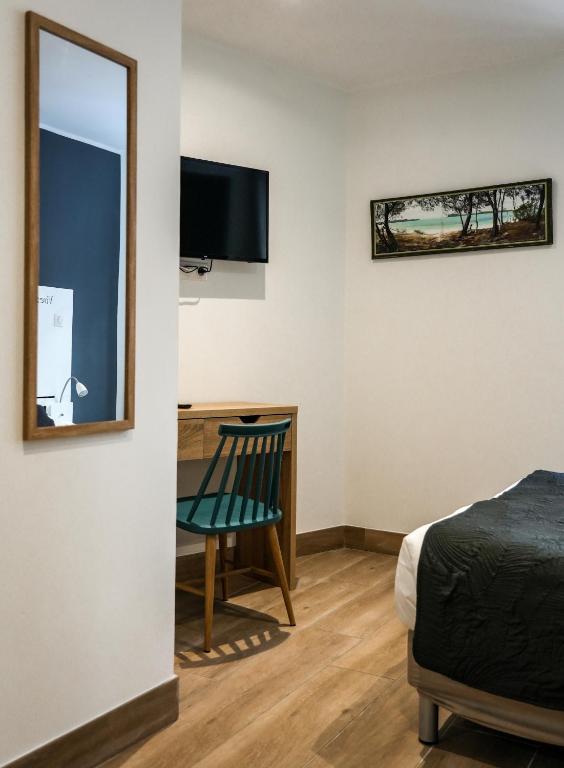 Postel nebo postele na pokoji v ubytování Celenya Hôtel