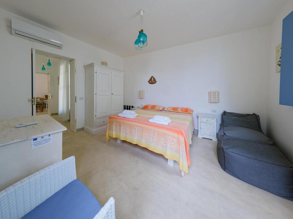 Postel nebo postele na pokoji v ubytování La Naca sul Mare - Suite