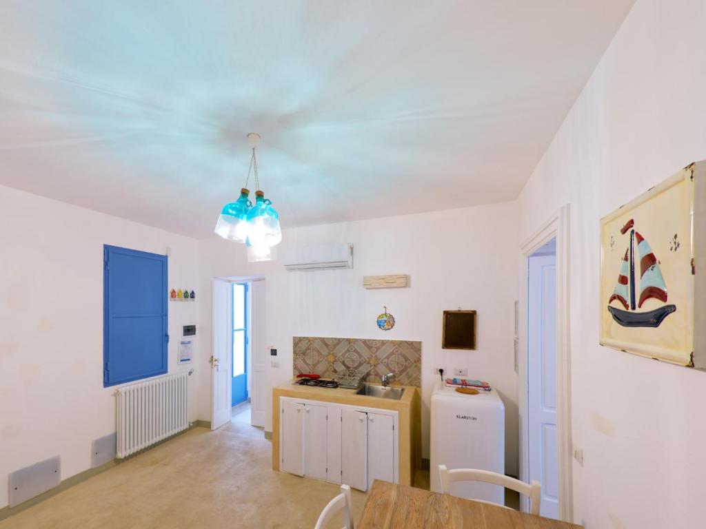 Kuchyň nebo kuchyňský kout v ubytování La Naca sul Mare - Suite