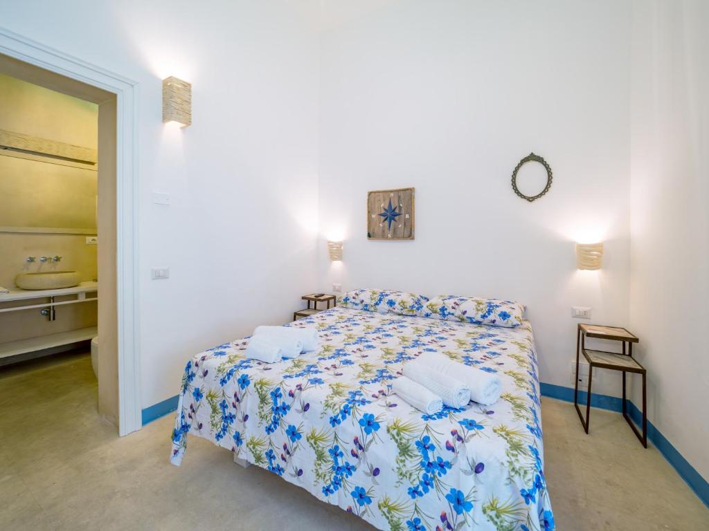 Postel nebo postele na pokoji v ubytování La Naca sul Mare - Suite