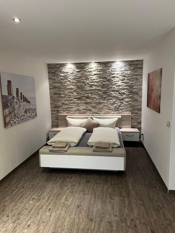 Appartement Augustaplatz tesisinde bir odada yatak veya yataklar