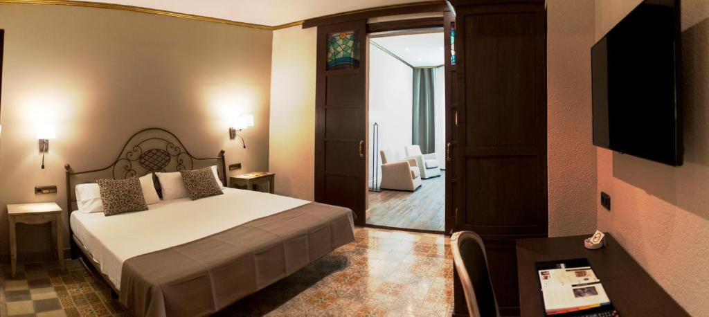 Postel nebo postele na pokoji v ubytování Hotel Diana